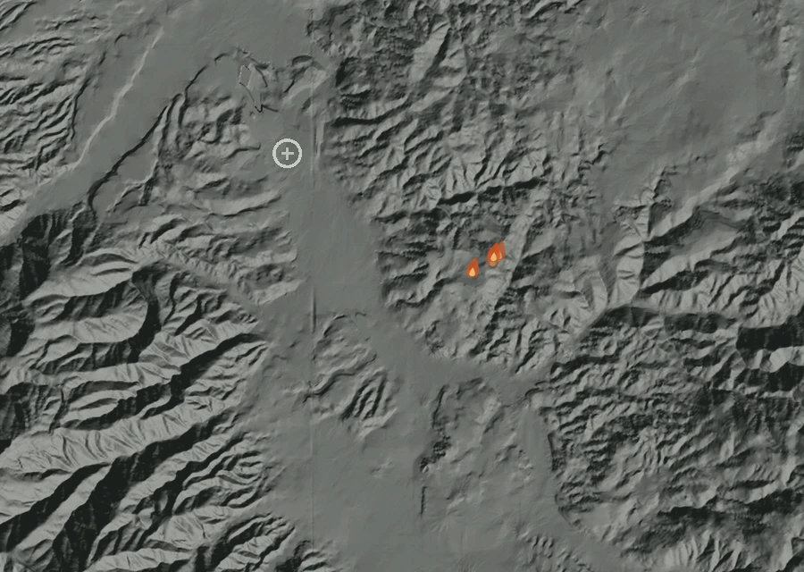 Shaded relief map of the Temescal Canyon Rd Ofrp  / Temescal Canyon Rd Fire. Amber flames mark every place that gave off heat in the last day; the shading is the shape of the ground.