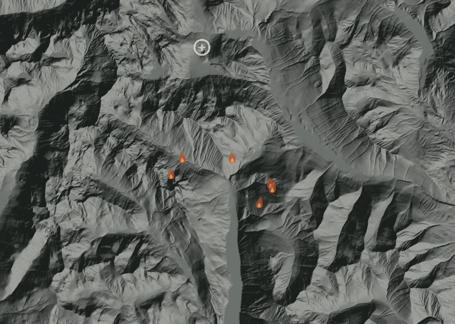 Shaded relief map of the Three Queens Fire. Amber flames mark every place that gave off heat in the last day; the shading is the shape of the ground.