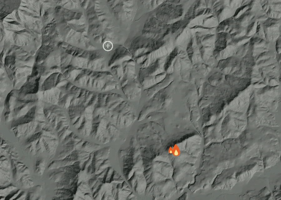 Shaded relief map of the Turkey Hill Fire. Amber flames mark every place that gave off heat in the last day; the shading is the shape of the ground.