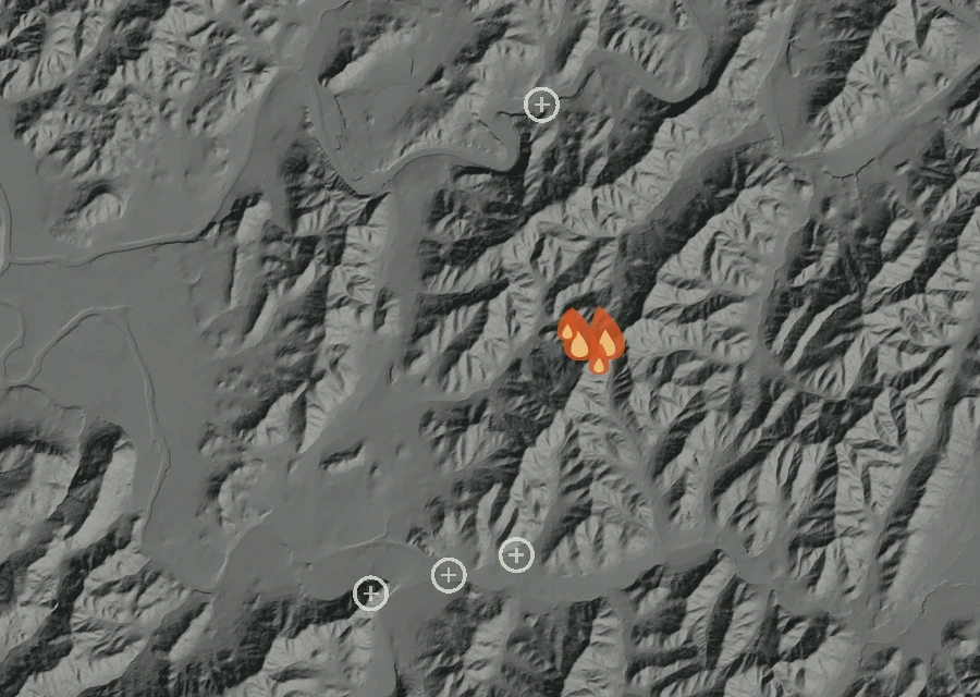 Shaded relief map of the Vine St Fire. Amber flames mark every place that gave off heat in the last day; the shading is the shape of the ground.