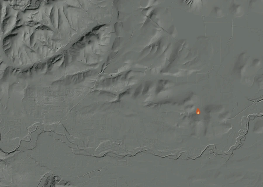 Shaded relief map of the Webb Lane Fire. Amber flames mark every place that gave off heat in the last day; the shading is the shape of the ground.