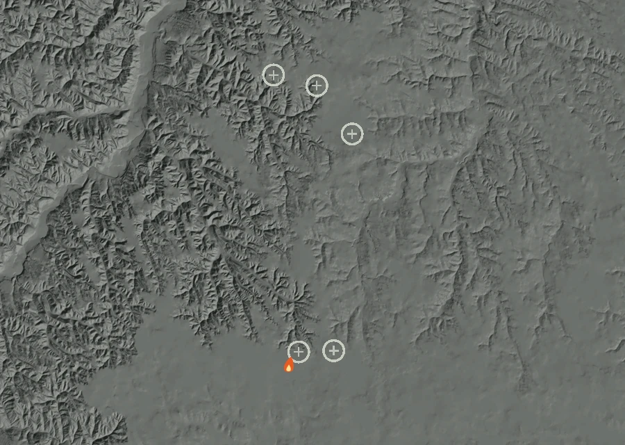 Shaded relief map of the West Bales Fire. Amber flames mark every place that gave off heat in the last day; the shading is the shape of the ground.