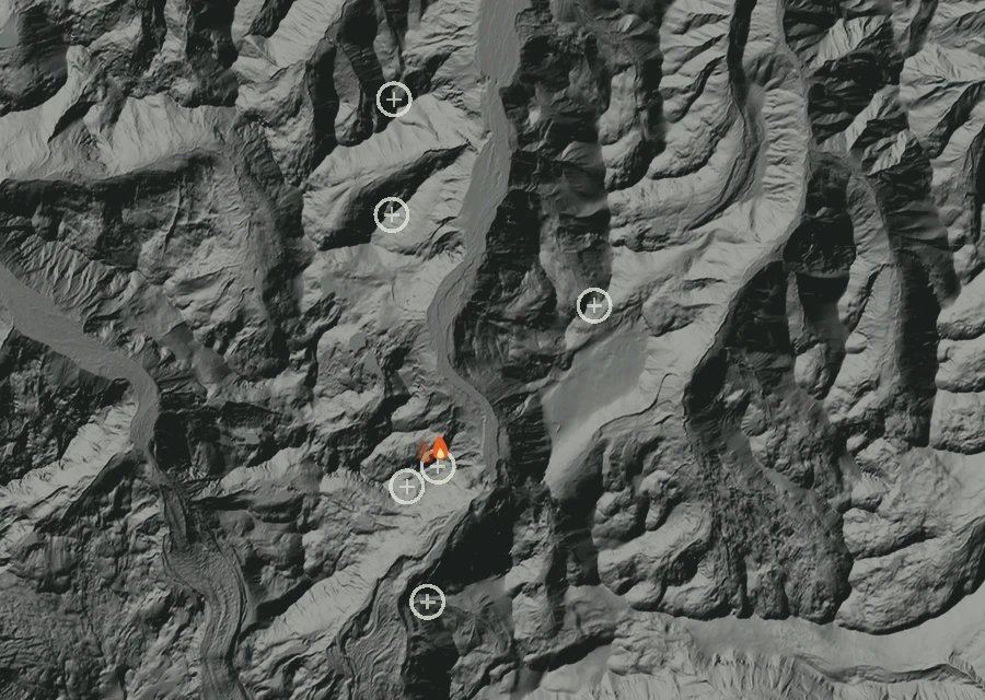 Shaded relief map of the White River Fire. Amber flames mark every place that gave off heat in the last day; the shading is the shape of the ground.
